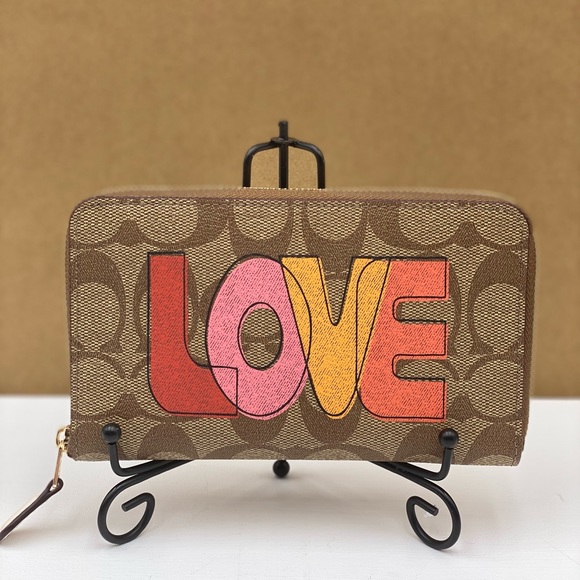 Coach Handbags - Coach Love Print Medium ZIP Around Wallet